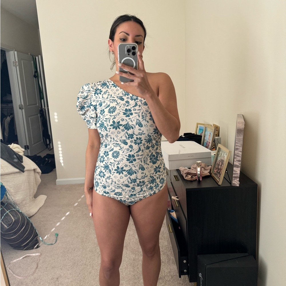 Free people one shoulder body suit. Worn once only size M